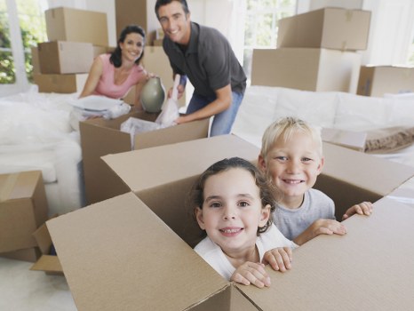 Local movers handling furniture in a Brent property