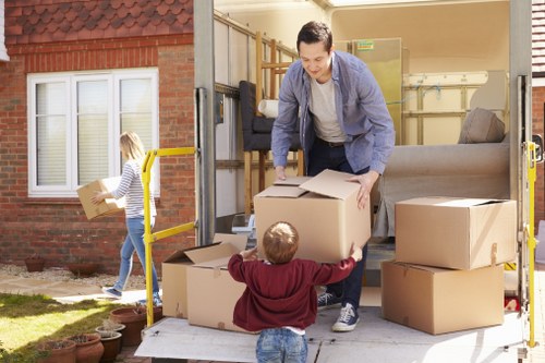 Man and van moving boxes from a flat in Brent