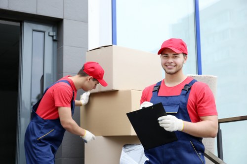 House movers assisting a Brent home relocation with careful loading