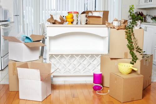 Household items and boxes prepared for a move within Brent