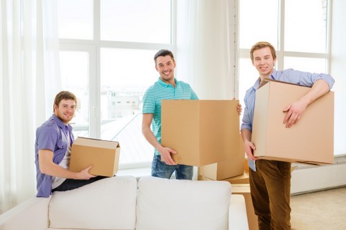 Packed boxes and furniture ready for local removals in Brent